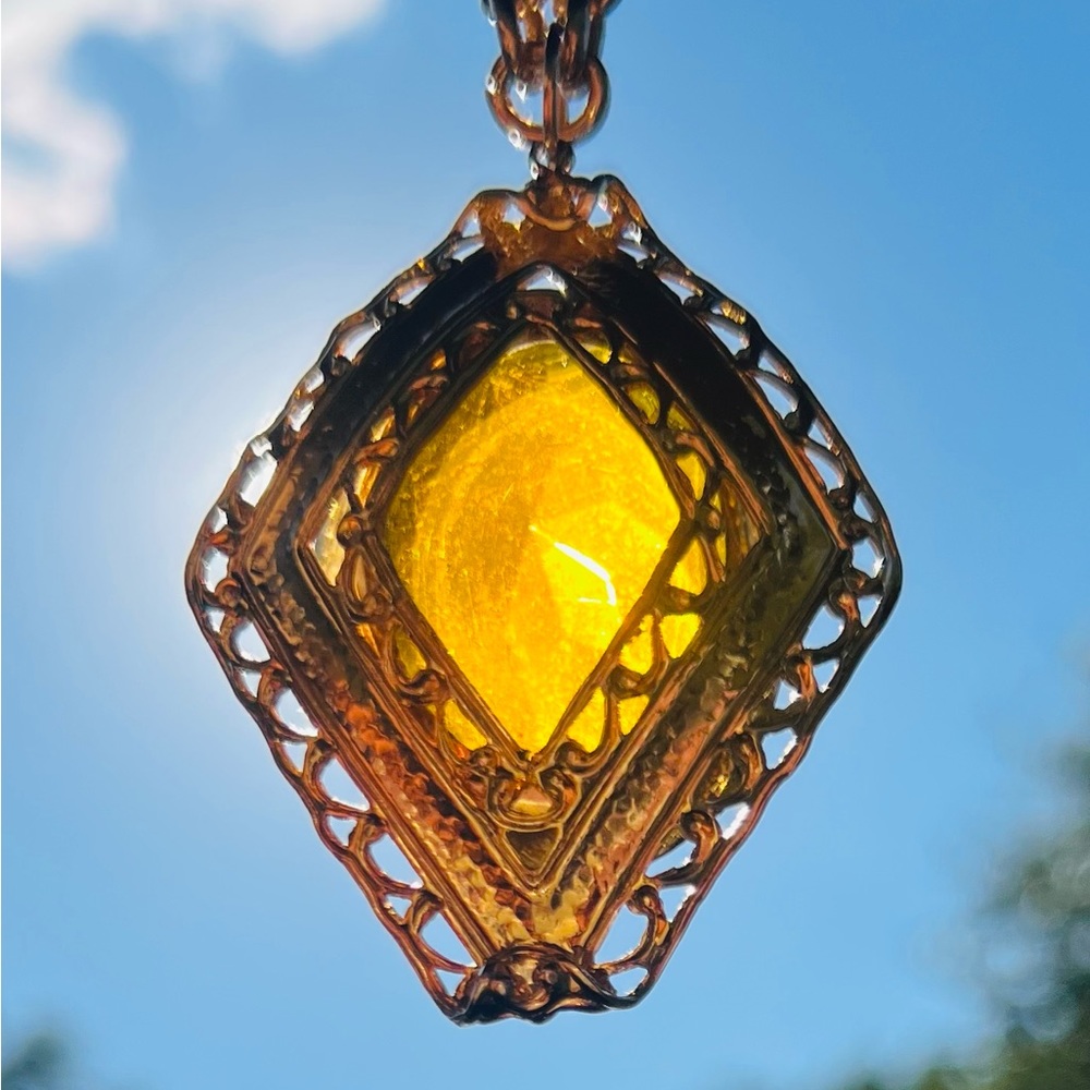 Vintage Gold Plated Scroll Diamond Shaped Necklace With Oval Amber Stone